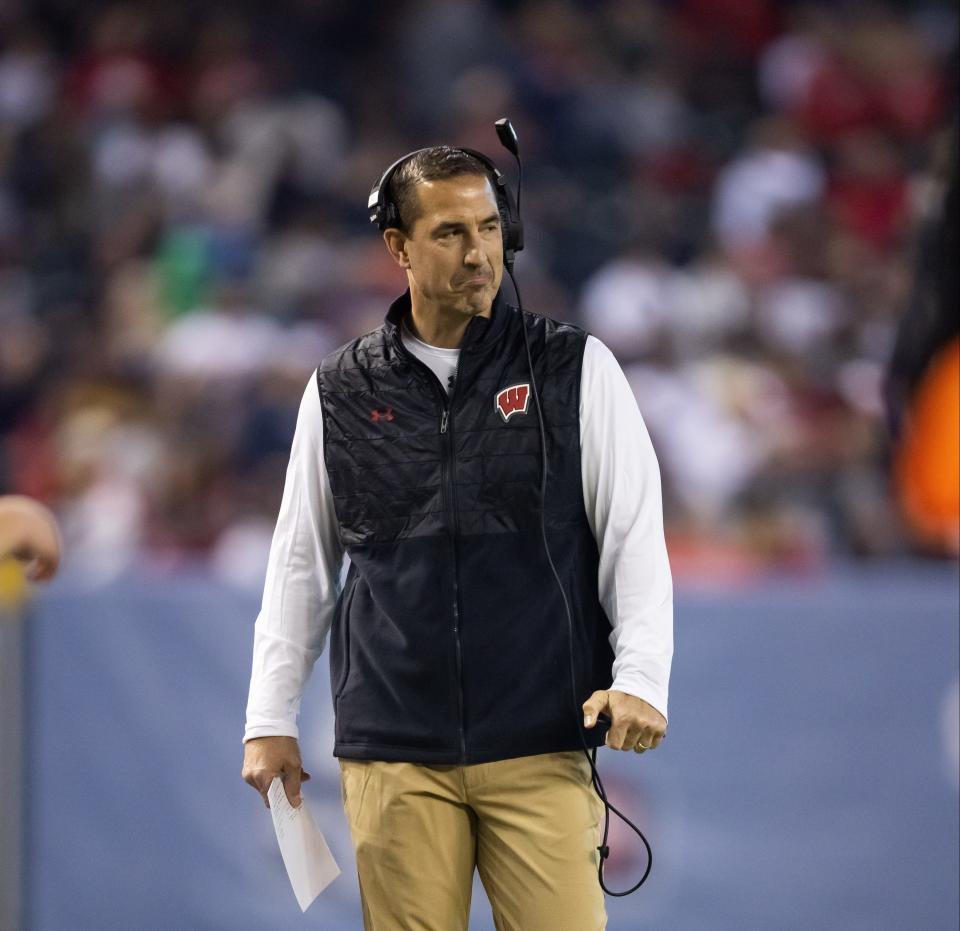 Dec. 27, 2022; Phoenix, Arizona; Wisconsin Badgers head coach Luke Fickell against the Oklahoma State Cowboys in the first half of the 2022 Guaranteed Rate Bowl at Chase Field. Mark J. Rebilas-USA TODAY Sports