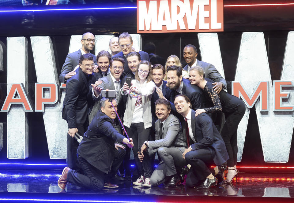 LONDON, ENGLAND - APRIL 26:  Cast members pose with Lottie French for a selfie during the European film premiere of "Captain America: Civil War" at Vue Westfield on April 26, 2016 in London, England  (Photo by Dave J Hogan/Dave J Hogan/Getty Images)