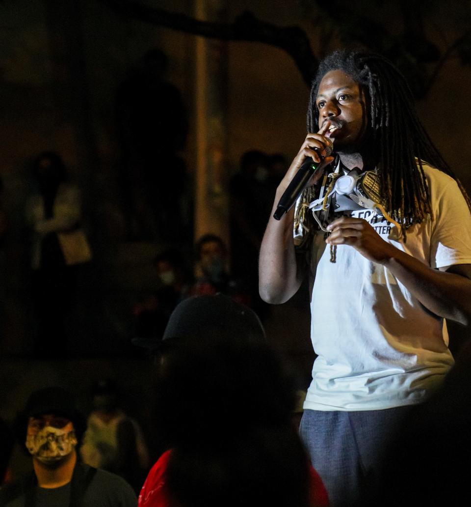 Artist and activist Donovan Smith, 28, speaks to the crowd outside the federal courthouse in Portland, Oregon, on Sunday, July 26, 2020.