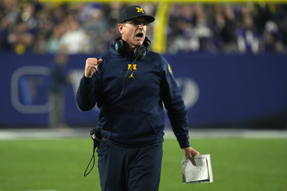 Michigan head coach Jim Harbaugh during the first half of the Fiesta Bowl NCAA college football semifinal playoff game against TCU, Saturday, Dec. 31, 2022, in Glendale, Arizona. (AP Photo/Rick Scuteri)