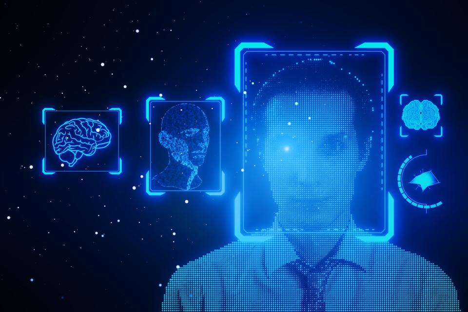 headshot of a man with blue digital images superimposed on top against a dark background