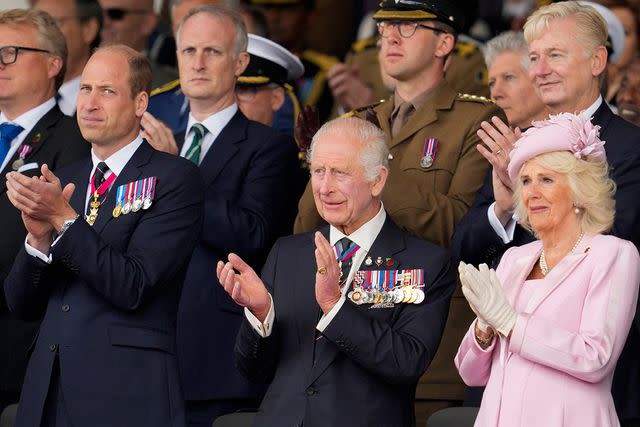 <p>KIN CHEUNG/POOL/AFP via Getty</p> From left: Prince William, King Charles and Queen Camilla attend event to mark the 80th anniversary of D-Day in Portsmouth, England, on June 5, 2024