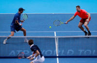 Tennis - ATP Finals - The O2, London, Britain - November 18, 2018 Mike Bryan and Jack Sock of the U.S. during their doubles match against France's Pierre-Hugues Herbert and Nicolas Mahut Action Images via Reuters/Andrew Couldridge