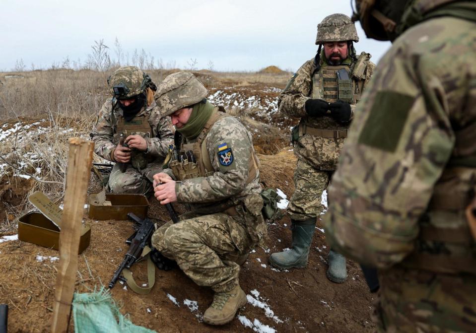 PHOTO: Ukrainian servicemen prepare their weapons during a military training exercise near the front line in the Donetsk region, on February 23, 2024, amid the Russian invasion of Ukraine. (Anatolii Stepanov/AFP via Getty Images)