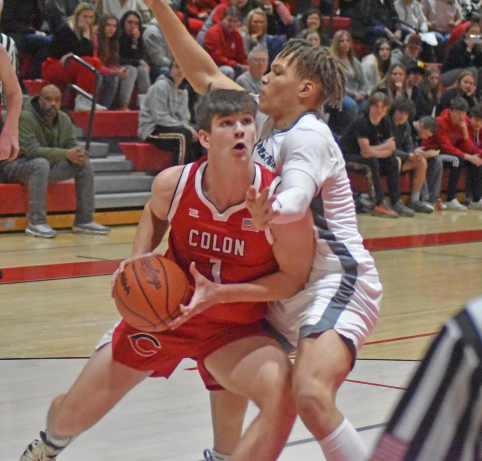 Colon senior Simon Vinson (1) looks for two in the paint versus Kalamazoo Phoenix on Wednesday night in the D4 Regional Finals.