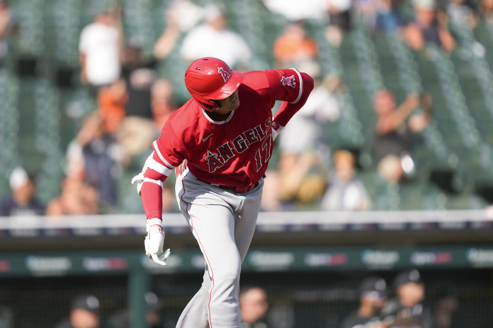 Los Angeles Angels' Shohei Ohtani watches his home run against the Detroit Tigers in the fourth inning during the second baseball game of a doubleheader, Thursday, July 27, 2023, in Detroit. (AP Photo/Paul Sancya)