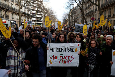 People and officials attend a gathering, organised by the CRIF, in memory of Mireille Knoll, in Paris, France, March 28, 2018. REUTERS/Gonzalo Fuentes