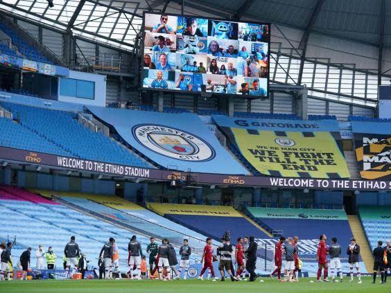 Liverpool walk through the guard of honour at the Etihad (POOL/AFP via Getty Images)