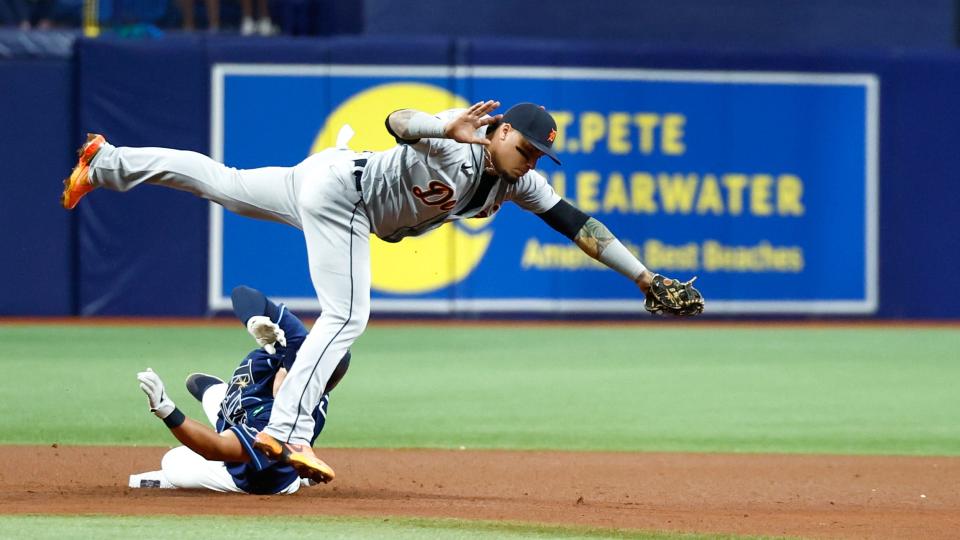 Tigers shortstop Javier Baez forces out Rays first baseman Ji-Man Choi at second base in the fourth inning on Tuesday, May 17, 2022, in St. Petersburg, Florida.