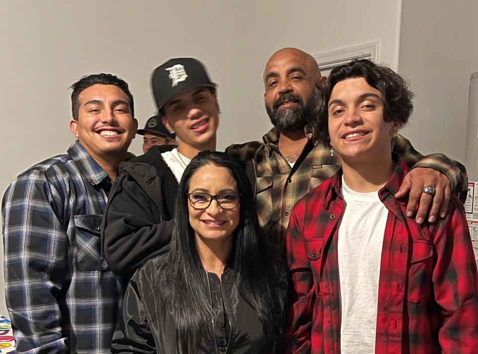 Amelia Antolin, with her sons, from left to right, Markie Jacobo, Dominik Jacobo, and her late son Stephen Jacobo in this undated photo. To Stephen Jacobo's right is Mark Jacobo. Stephen Jacobo died Nov. 6, 2022 in a west Phoenix.