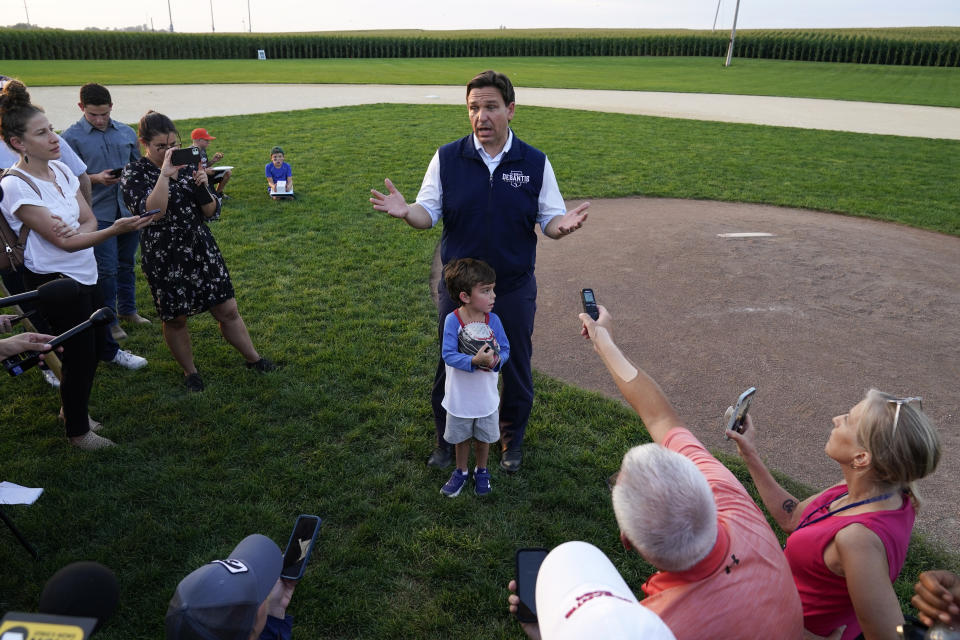 Republican presidential candidate Florida Gov. Ron DeSantis speaks to reporters during a campaign stop at the Field of Dreams movie site, Thursday, Aug. 24, 2023, in Dyersville, Iowa. (AP Photo/Charlie Neibergall)