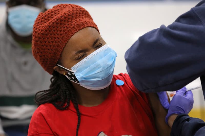 Health workers from Humber River Hospital hold a vaccination clinic in Toronto