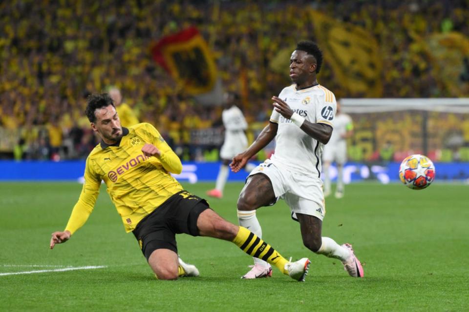 Vinicius Jr of Real Madrid is challenged by Mats Hummels of Borussia Dortmund (Getty Images)