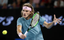 Tennis - Australian Open - Fourth Round - Melbourne Park, Melbourne, Australia, January 20, 2019. Greece’s Stefanos Tsitsipas in action during the match against Switzerland’s Roger Federer. REUTERS/Aly Song