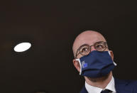 European Council President Charles Michel wears a protective mask as he waits for the arrival of Croatia's Prime Minister Andrej Plenkovic, ahead of a meeting on the sidelines of an EU summit at the European Council building in Brussels, Thursday, Oct. 1, 2020. European Union leaders are meeting to address a series of foreign affairs issues ranging from Belarus to Turkey and tensions in the eastern Mediterranean. (John Thys, Pool via AP)