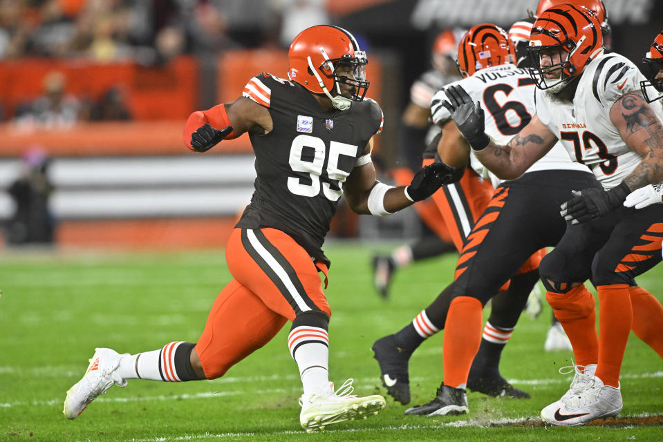 Cleveland Browns defensive end Myles Garrett (95) rushes Cincinnati Bengals quarterback Joe Burrow during the first half of an NFL football game in Cleveland, Monday, Oct. 31, 2022. (AP Photo/David Richard)