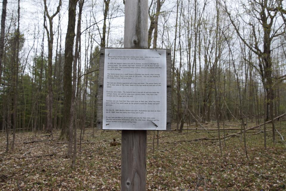 Throughout the area, signs are placed including information about the Siebert family. The family once had a homestead in what is now the North Central Michigan College Natural Area.
