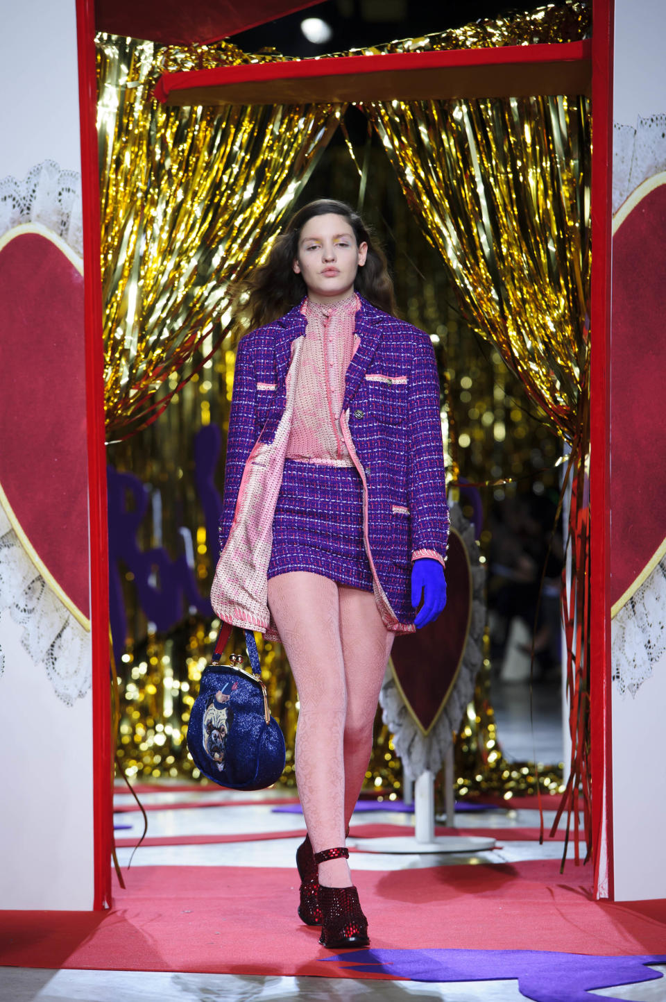 A model wears a design created by Meadham Kirchhoff during London Fashion Week Autumn/Winter 2014, at the Tate Modern in central London, Tuesday, Feb. 18, 2014. (Photo by Jonathan Short/Invision/AP)