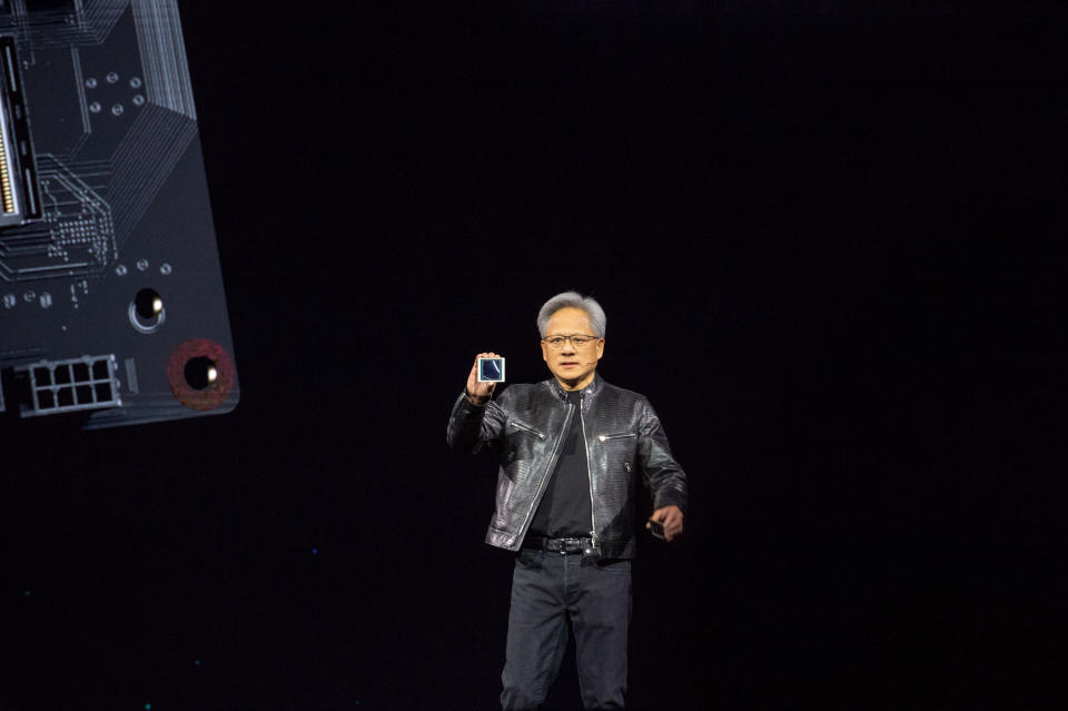 18 March 2024, USA, San Jose: Jensen Huang, head of the chip company Nvidia, presents the new AI chip Blackwell at the company's own developer conference GTC. The chip company Nvidia wants to expand its leading role in technology for artificial intelligence applications with a new generation of its computer platform. Photo: Andrej Sokolow/dpa (Photo by Andrej Sokolow/picture alliance via Getty Images)