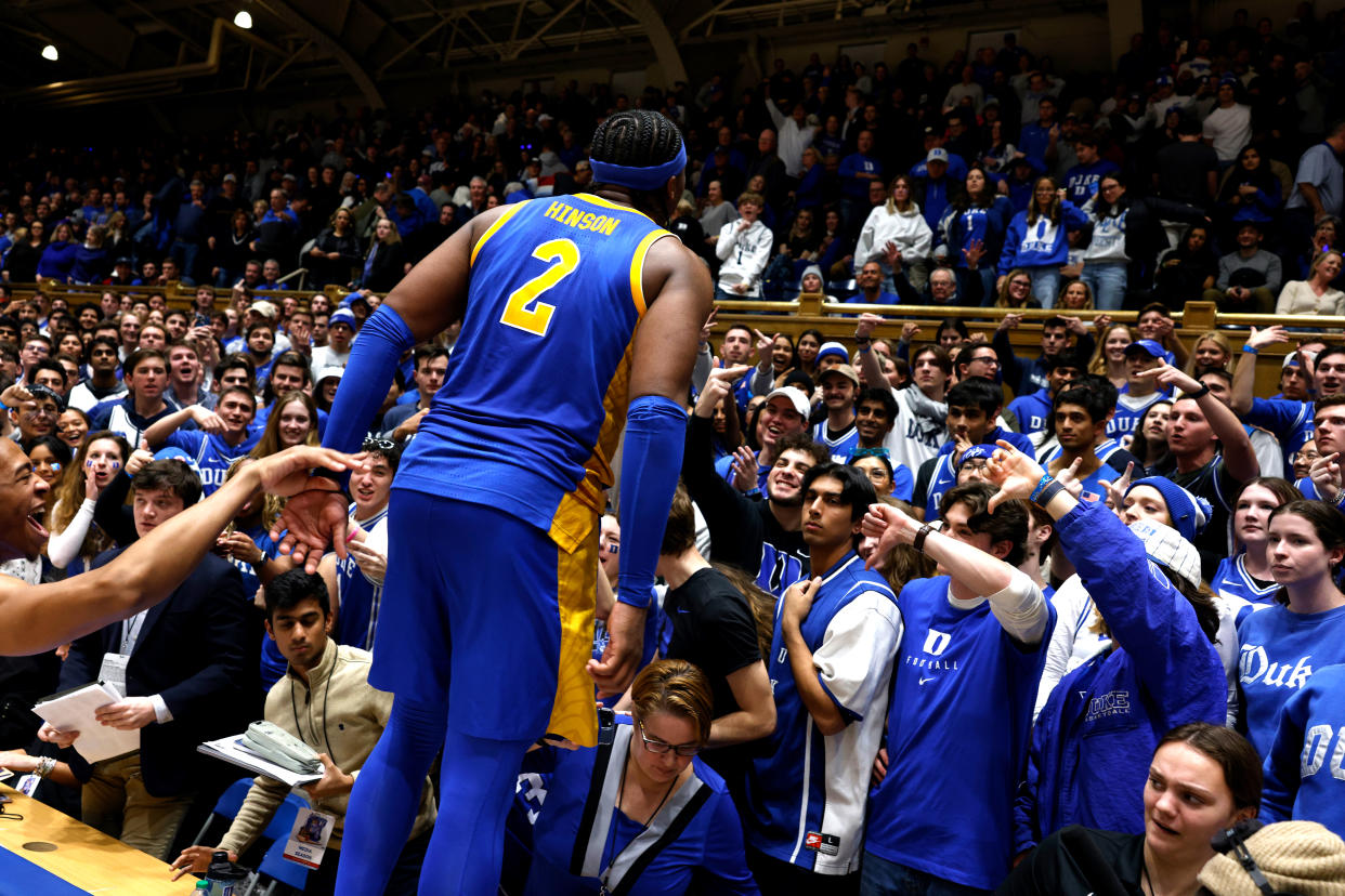 Blake Hinson celebrates in front of the Cameron Crazies following Pittsburgh's 80-76 win over the Duke Blue Devils on Jan. 20 at Cameron Indoor Stadium. (Photo by Lance King/Getty Images)