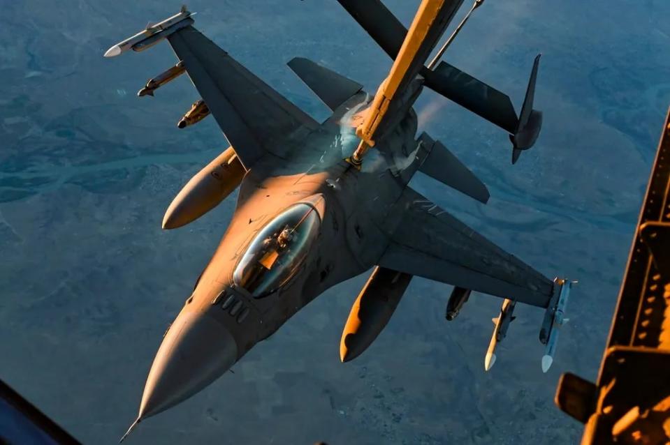 A U.S. Air Force F-16 Fighting Falcon connects with a KC-10 Extender over Iraq in 2021. (Staff Sgt. Jerreht Harris/U.S. Air Force)