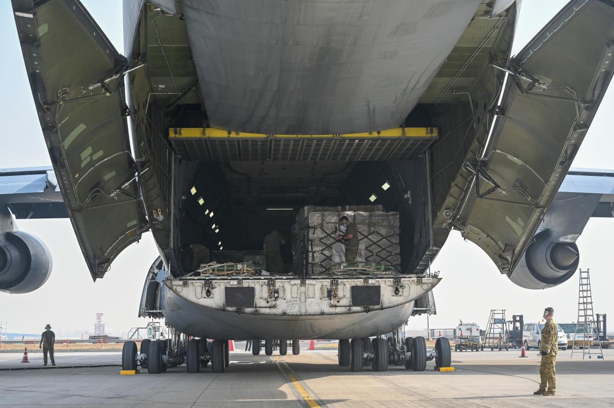 <p>A US Air Force aircraft carrying relief supplies from the United States in the wake of India’s COVID-19 situation arrives at the Indira Gandhi International Airport</p> (AP)