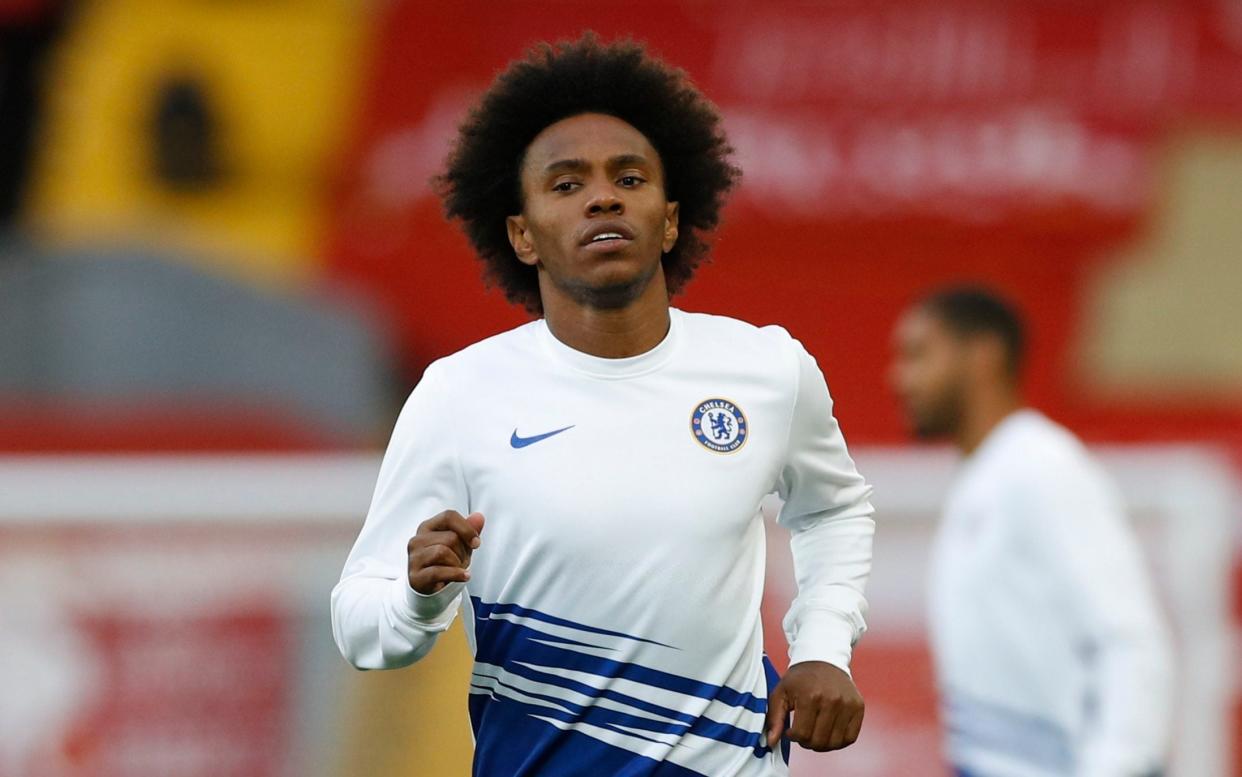 Willian playing for Chelsea - Arsenal to press on with Willian signing despite staff redundancies announcement - REUTERS