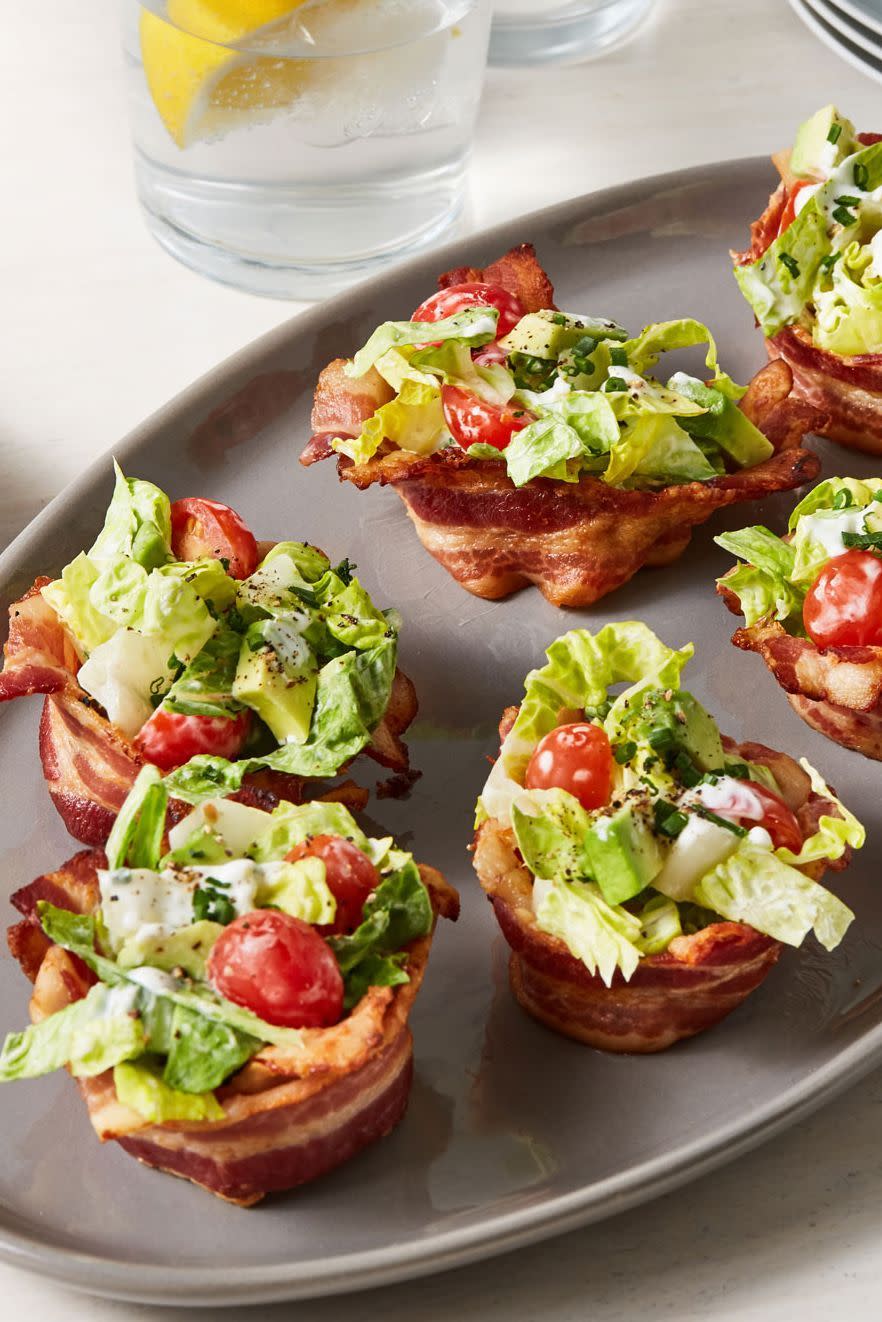<p>These lighter take on a <a href="https://www.delish.com/cooking/recipe-ideas/a27360555/classic-blt-recipe/" rel="nofollow noopener" target="_blank" data-ylk="slk:classic BLT;elm:context_link;itc:0;sec:content-canvas" class="link ">classic BLT</a> skip the bread and put major emphasis on the bacon—which is what you <em>really</em> want. We replaced the mayo with Greek yogurt to help make these lighter as well, but you can use the traditional mayonnaise or even sour cream if you prefer.</p><p>Get the <strong><a href="https://www.delish.com/cooking/recipe-ideas/recipes/a52604/blt-cups-recipe/" rel="nofollow noopener" target="_blank" data-ylk="slk:BLT Cups recipe;elm:context_link;itc:0;sec:content-canvas" class="link ">BLT Cups recipe</a></strong>.</p>