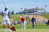 Jun 16, 2018; Southampton, NY, USA; Brooks Koepka putts the first green as Ian Poulter looks on during the third round of the U.S. Open golf tournament at Shinnecock Hills GC - Shinnecock Hills Golf C. Brad Penner-USA TODAY Sports