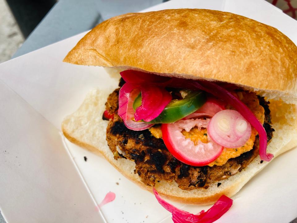 Finished Dish #2: Black bean burger topped with quick pickles (these were super spicy) and romesco sauce.