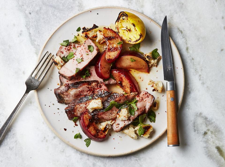 Grilled Pork Chops with Plums, Halloumi, and Lemon