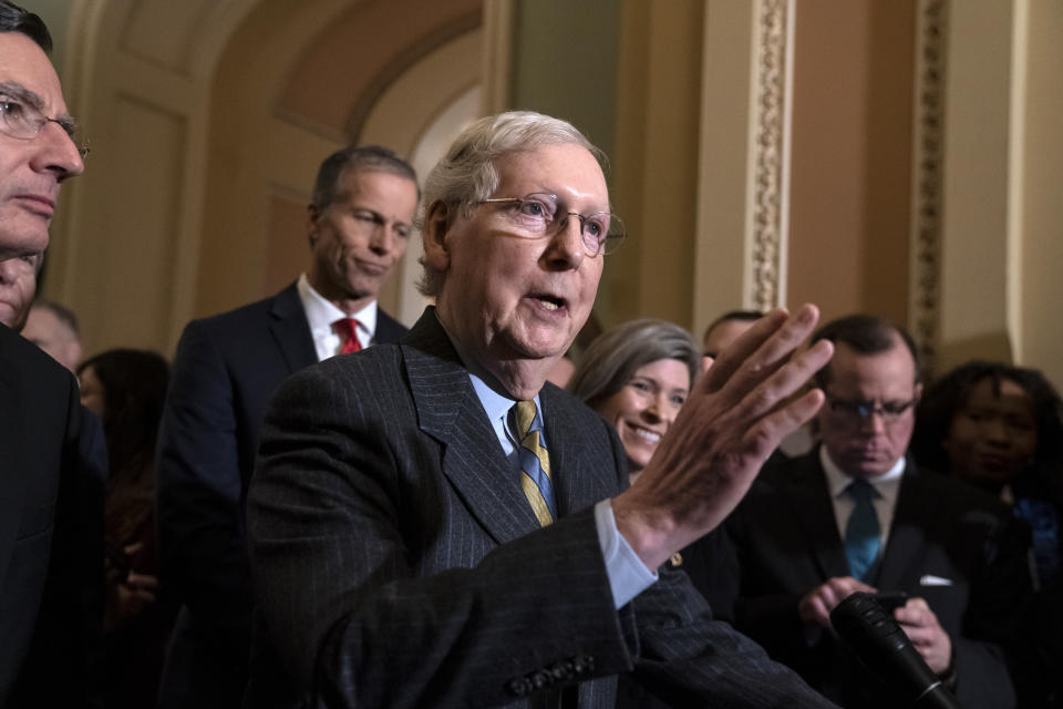 Senate Majority Leader Mitch McConnell, R-Ky., joined from left by Sen. John Barrasso, R-Wyo., Majority Whip John Thune, R-S.D., and Sen. Joni Ernst, R-Iowa, meets with reporters as the House prepares to send the articles of impeachment against President Donald Trump to the Senate, at the Capitol in Washington, Tuesday, Jan. 14, 2020. (AP Photo/J. Scott Applewhite)