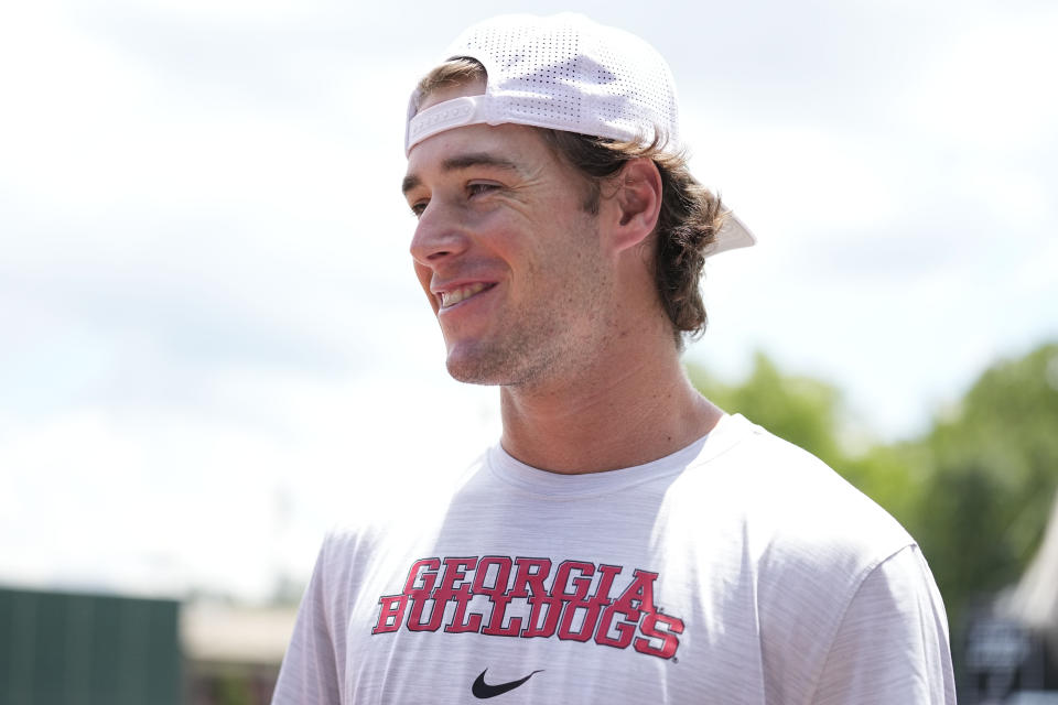 Georgia's Charlie Condon speaks to the media before an NCAA college baseball practice, Wednesday, May 15, 2024, in Athens, Ala. (AP Photo/Brynn Anderson)