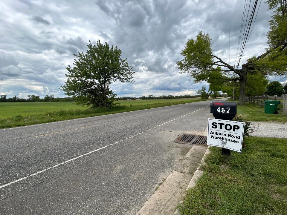 Neighbors on Auburn Road in Pilesgrove show their opposition to a warehouse complex on parcel that was used for farmland.