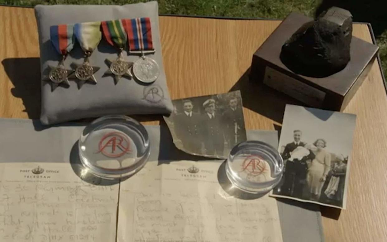 The Bismarck's shrapnel alongside Gordon Hall's medals and photographs, with the telegram to his wife, sent in 1941. As shown on BBC Antiques Roadshow in April 2019. - BBC Antiques Roadshow