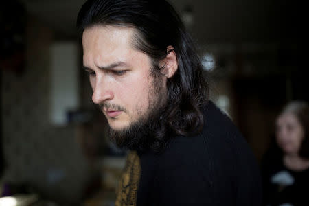 Pawel, a member of the Union of Orthodox Banner-Bearers, is seen at his house in Solnechnogorsk, Russia, July 19, 2018. REUTERS/Ekaterina Anchevskaya