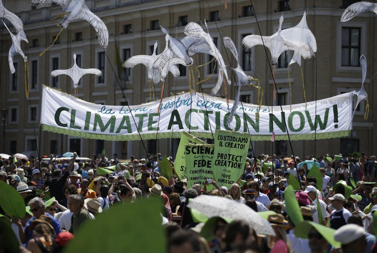 A march for climate action in St. Peter's Square at the Vatican in June 2015. Pope Francis praised the participants, who included Christians, Muslims, Jews and Hindus. <a href="https://newsroom.ap.org/detail/VaticanPopeEnvironment/962b7e2ac9204421801566ce05a98176/photo?Query=vatican%20environment&mediaType=photo&sortBy=creationdatetime:desc&dateRange=Anytime&totalCount=144&currentItemNo=59" rel="nofollow noopener" target="_blank" data-ylk="slk:AP Photo/Andrew Medichini;elm:context_link;itc:0;sec:content-canvas" class="link ">AP Photo/Andrew Medichini</a>