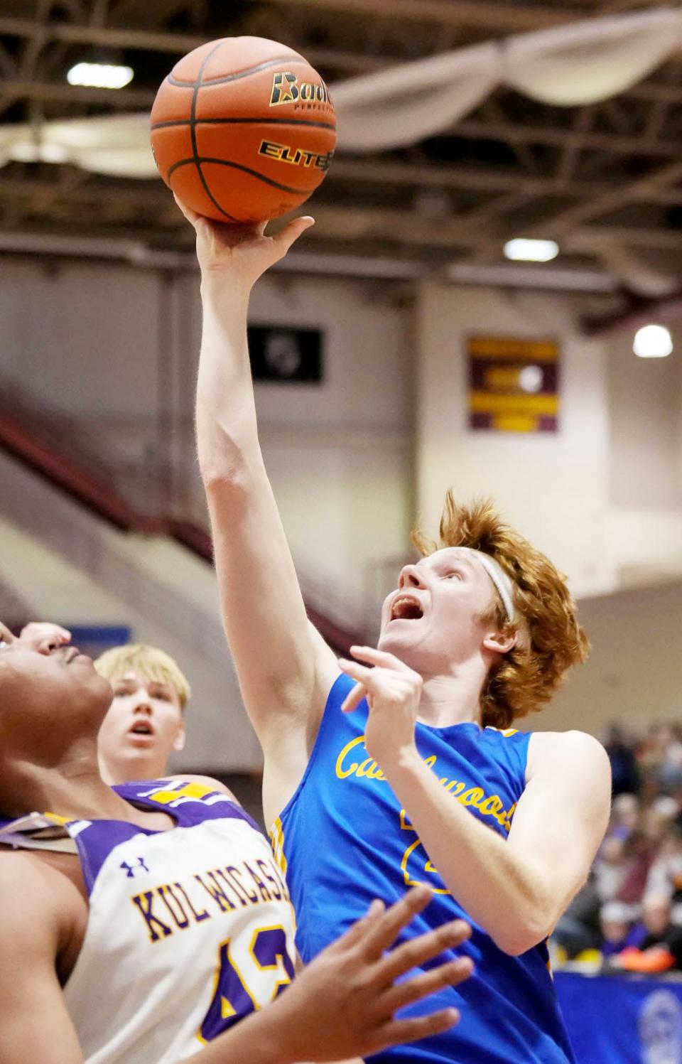 Castlewood's Lane Tvedt shoots over a Lower Brule defender during their first-round game in the state Class B boys basketball tournament on Thursday, March 16, 2023 in the Barnett Center at Aberdeen.