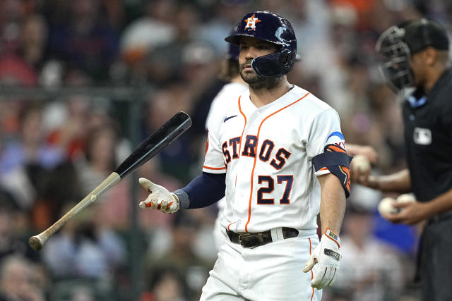 Houston Astros shortstop Mauricio Dubon (14) hits an RBI single to left  field in the bottom of the fifth inning of the MLB game between the Houston  As Stock Photo - Alamy