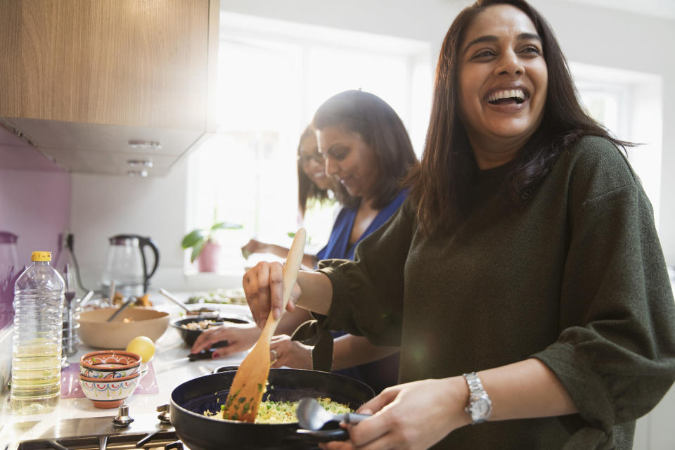 a family cooking together