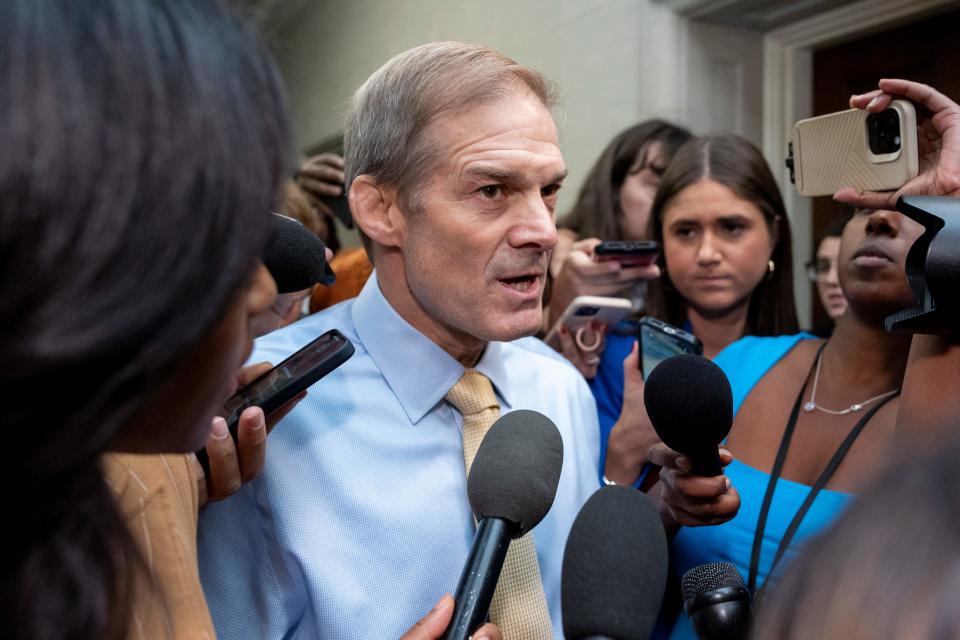 Rep. Jim Jordan, R-Ohio, speaks to reporters after departing from a GOP caucus meeting working to formally elect a new speaker of the House.
