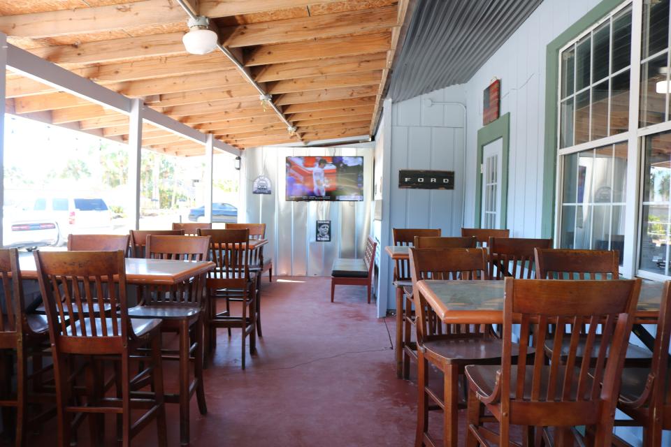 The Rusty Grill has it offers indoor and outdoor seating on a covered deck, with TVs filling each wall of the restaurant