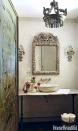 <p>The combination of a few luxe touches-Baguès-style sconces, an intricately carved Italian Baroque mirror, an antique French-limestone floating vanity-creates old-world elegance and a sense of luxury without leaving the house.</p>