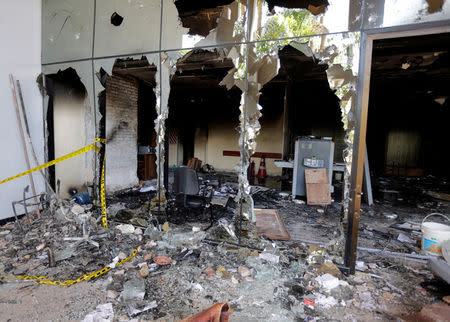 View of the interior of the building of the Congress, which was damaged after a demonstration against a proposed amendment that would allow Paraguay's president to stand for re-election, in Asuncion, Paraguay April 4, 2017. REUTERS/Jorge Adorno