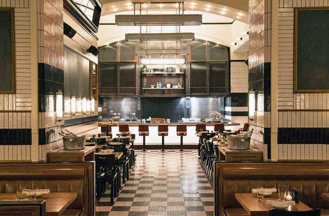 <p>Chef Marc Murphy (of ) has nestled into , a New American spot inside the new , which opened in October. The retro room resembles a well-worn Polaroid of bistro blacks and whites, leather banquettes, antique-style lights, and subway tiles. The Kingside burger (with soppressata and white cheddar) and roasted chicken (for two) are approachable and pair well with the salt and pepper fries. Cocktails, courtesy the Gerber Group are tops, but don’t overlook the local beer selection.</p> <p><strong>Plan Your Trip: </strong>Visit </p>