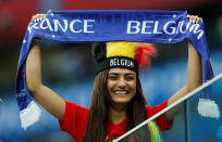 <p>A Belgian fan waits for the match to kick off </p>