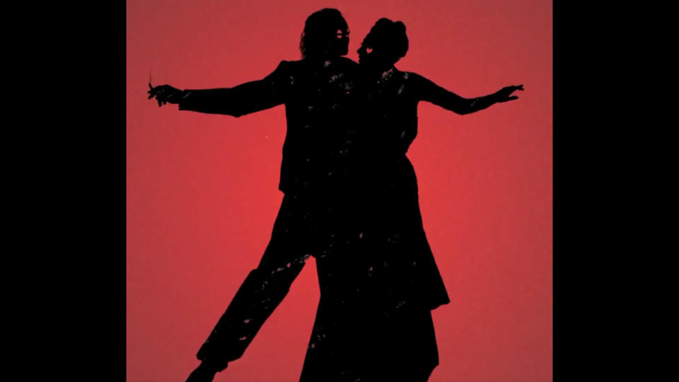 Joaquin Phoenix and Lady Gaga's silhouettes dancing in Joker: Follie à Deux.