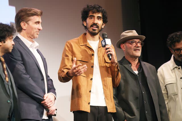 <p>Roger Kisby/Getty Images for Universal Pictures</p> Dev Patel (center) on March 11, 2024