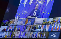 European Council President Charles Michel, top of screen, speaks with EU leaders during an EU summit in video conference format at the European Council building in Brussels, Wednesday, Aug. 19, 2020. European Union leaders are putting on a show of support Wednesday for people rallying in Belarus by convening emergency talks to highlight their concern about the contested presidential election and ratchet up pressure on officials linked to the security crackdown that followed. (Olivier Hoslet, Pool Photo via AP)