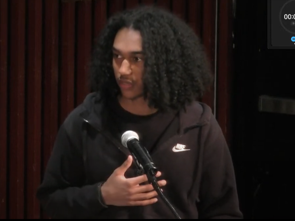 Brockton High School senior and student ambassador Marcos Gomes speaks to the Brockton School Committee on April 9, 2024, about the impact of the district's decision to cut positions in its office of Equity, Diversity and Inclusion.